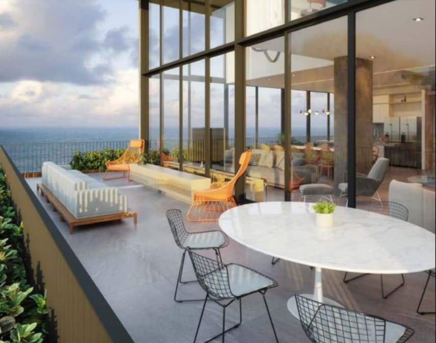 Gourmet balcony with ocean view at sunset