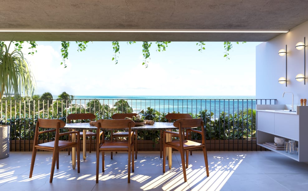 Terrace with dining table and ocean view