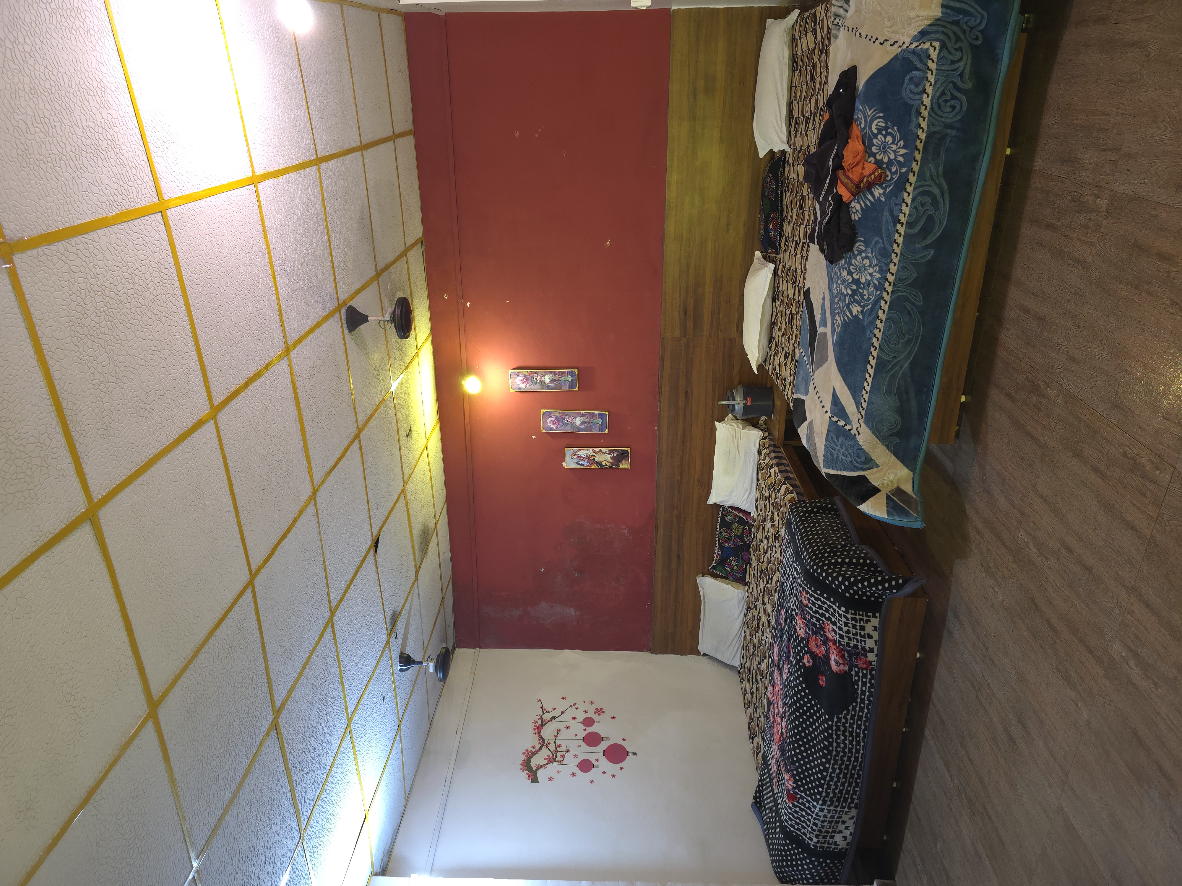 Family room with two double beds at Mahaveer Home Stay
