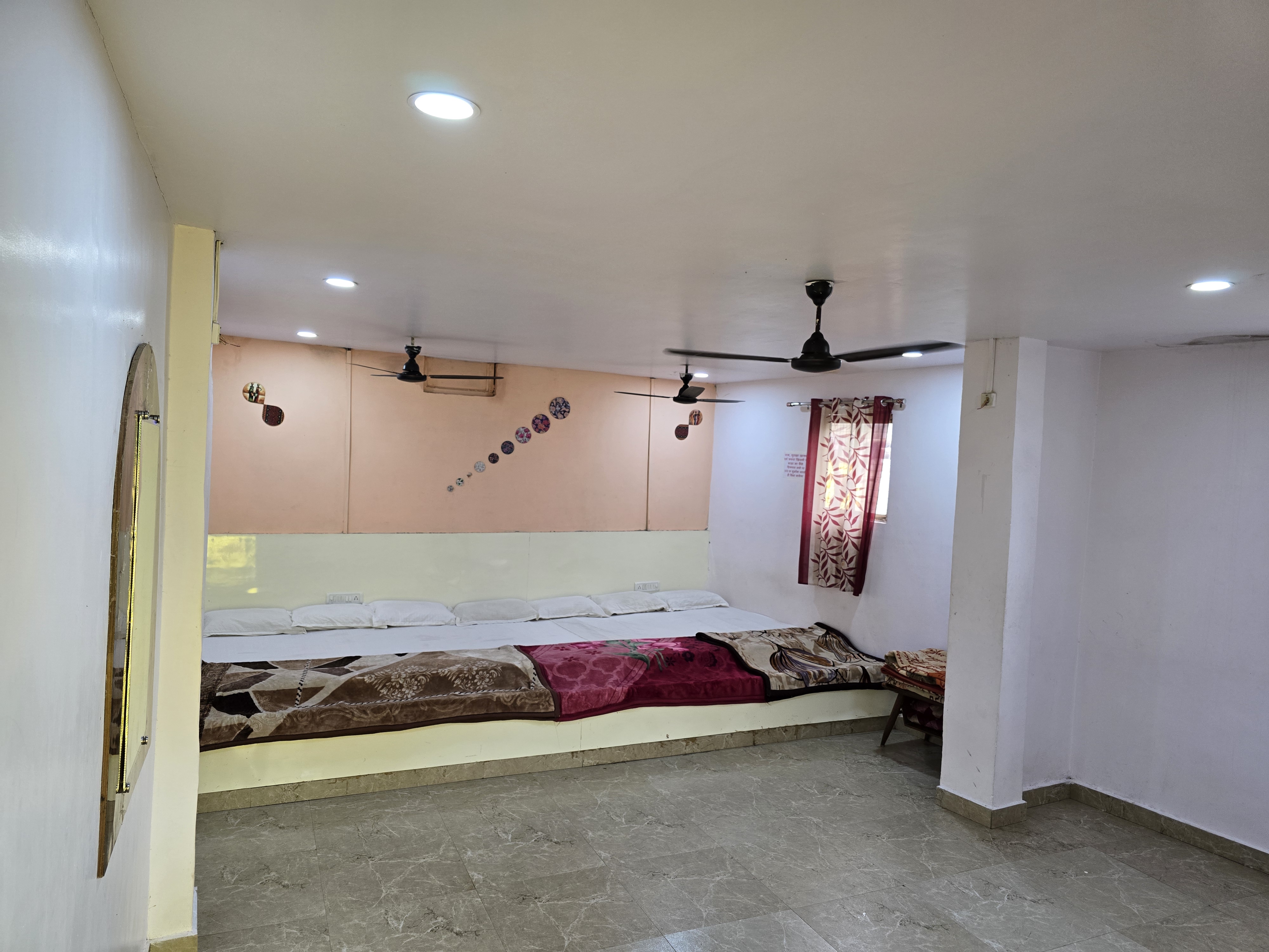 Large group room with extra bedding at Mahaveer Home Stay