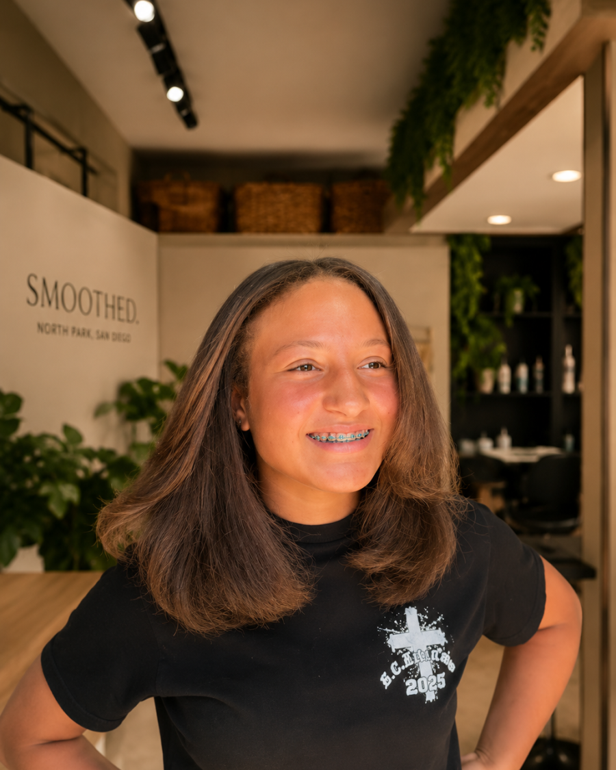 Teya at SMOOTHED, hair worn down and smooth