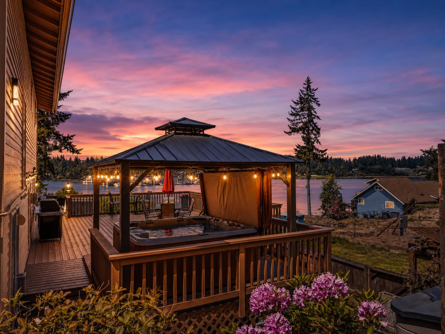 Deck and water-view lifestyle at 2540 E Phinney Bay Place