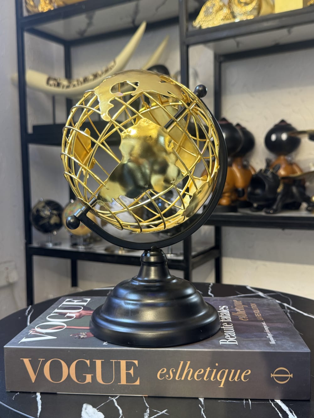 Big  golden globe decor 