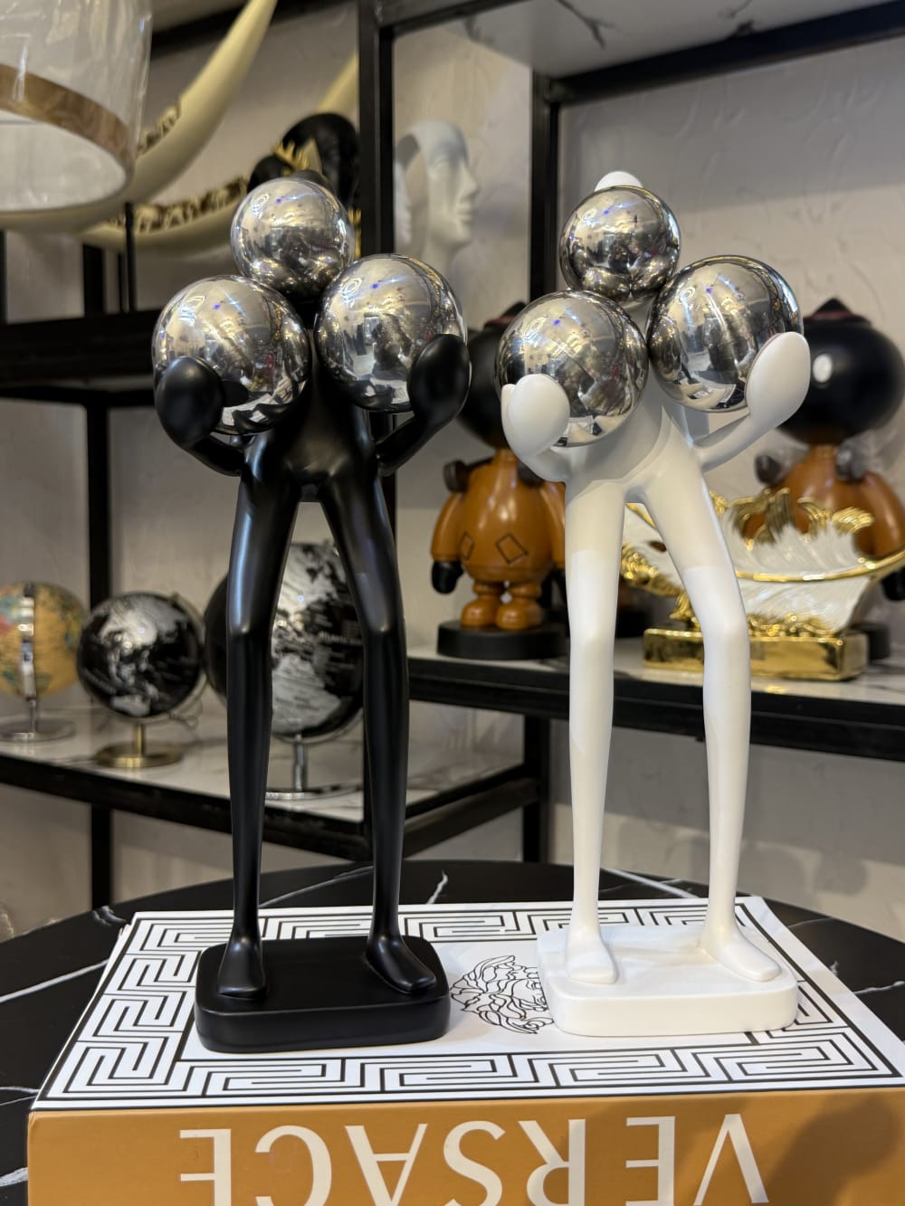 Man carrying light decor 