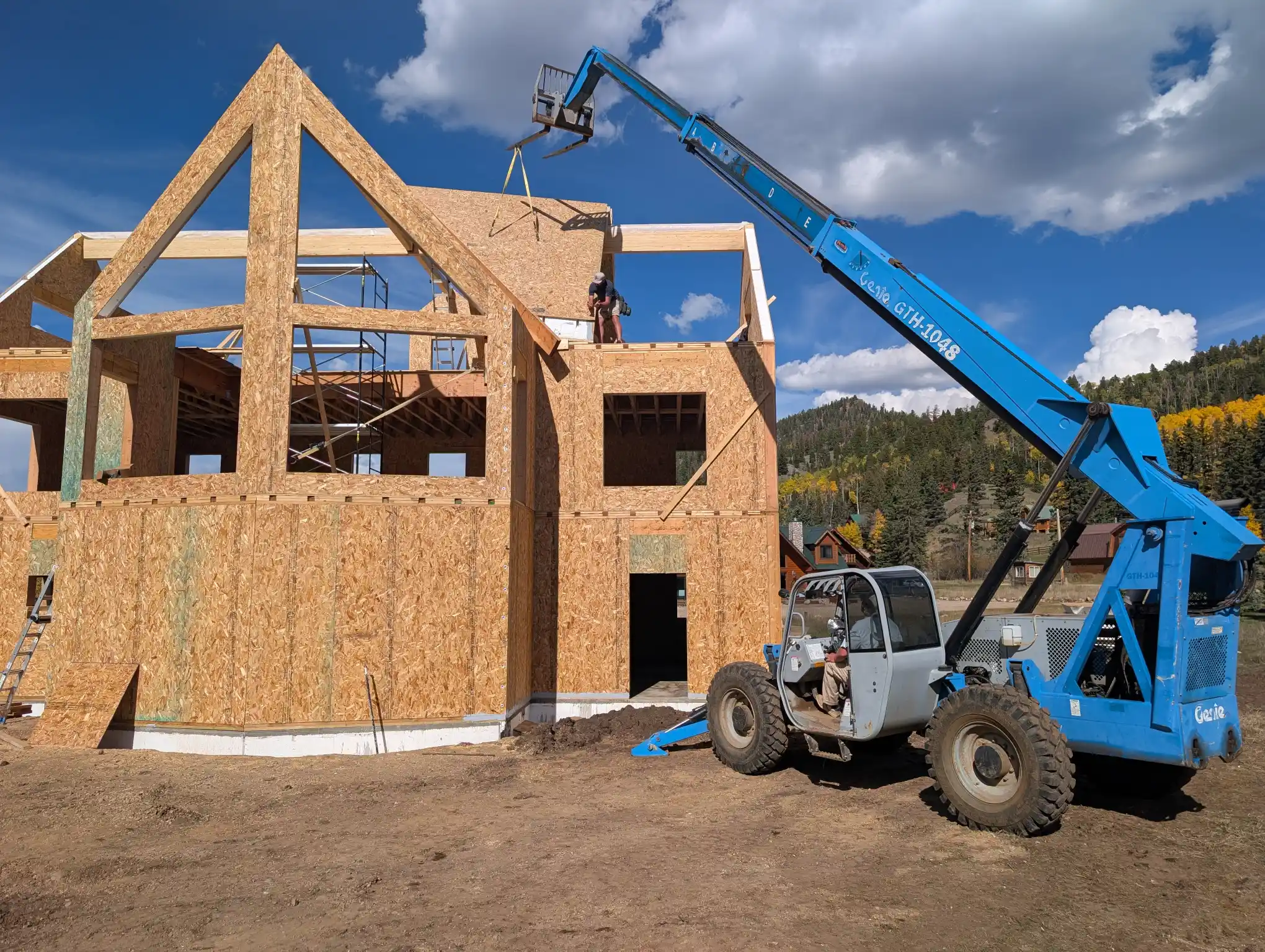 Lifting a SIP roof panel into place