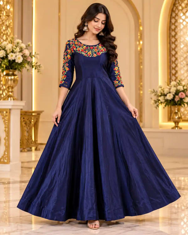 Elegant-navy-blue-gown-featuring-vibrant-multicolour-floral-embroidery-on-the-neckline-and-sleeves — Gown