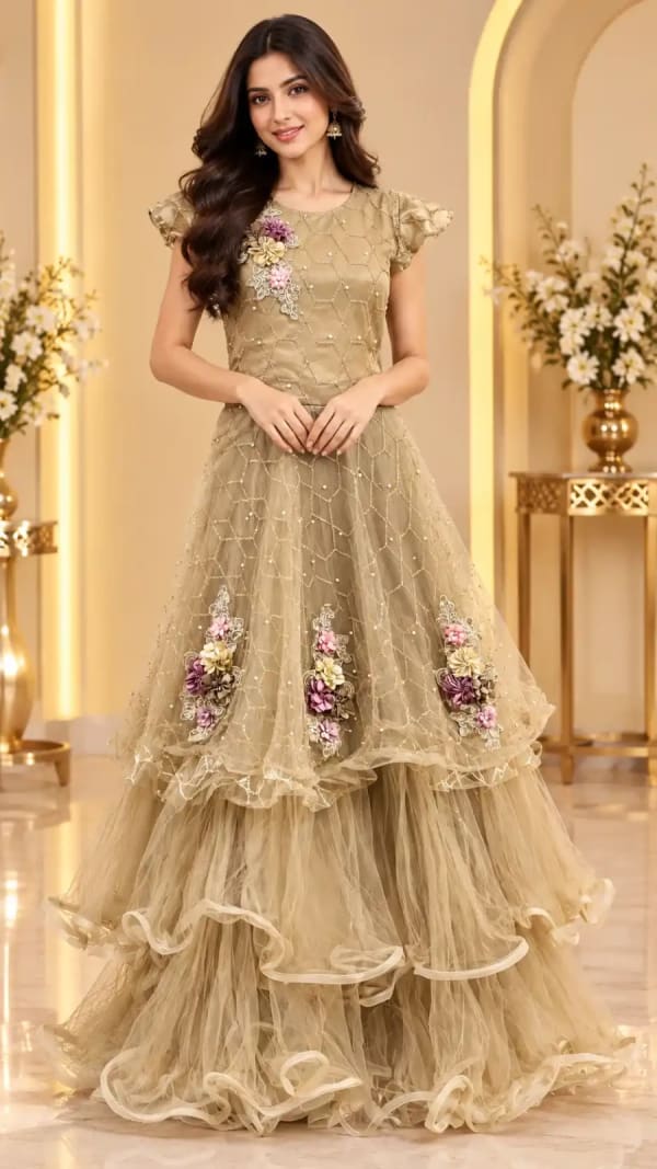 Elegant champagne-gold layered gown featuring delicate pearl detailing — Gown