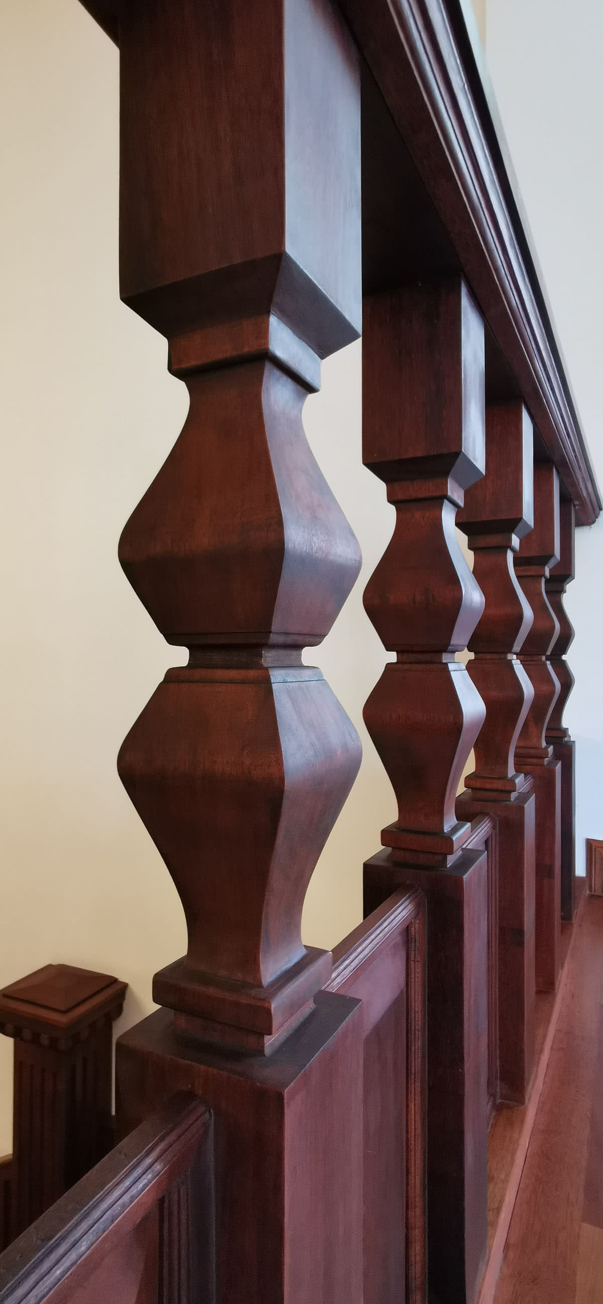 Restored carved timber balusters and railing detailing at Seri Negara heritage conservation project.