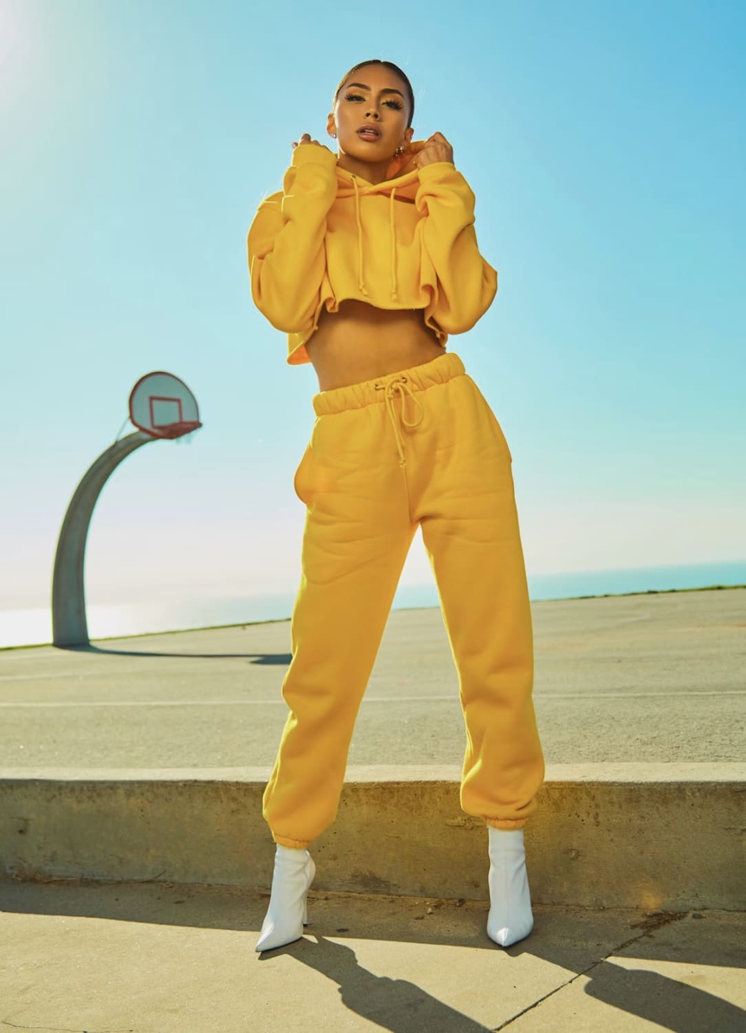 Lemaire Belted Trench Coat full silhouette in warm light