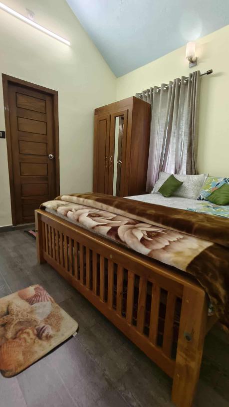 Clean and welcoming rooms at Kanthaloor Jeep Agency