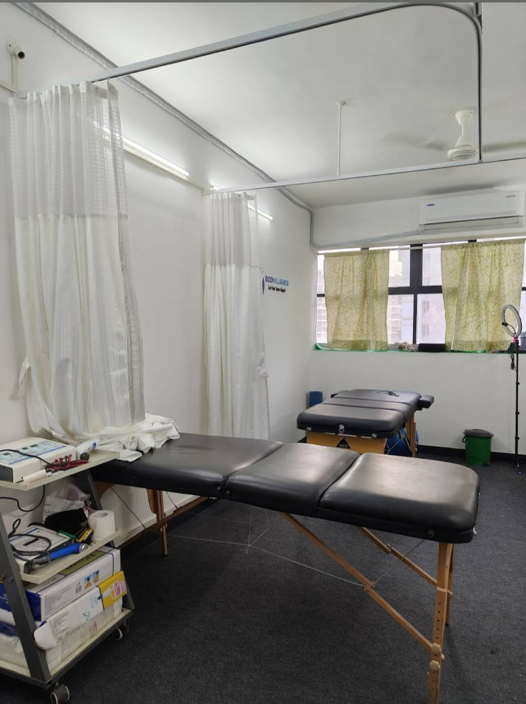 BodyAligner clinic treatment room with therapy tables