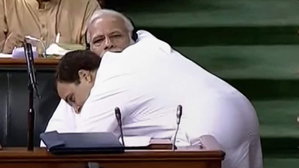 705627-rahul-hugs-modi-pti