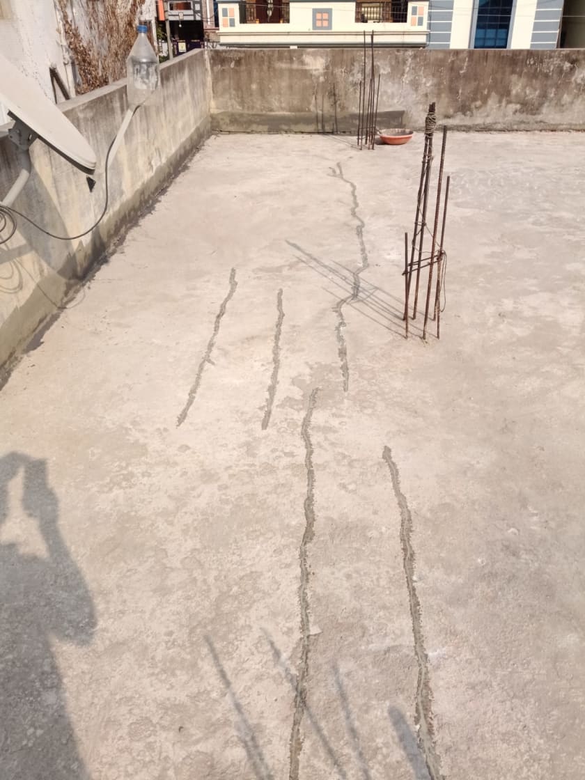 Terrace floor crack filling before waterproofing at Turkayamjal, Hyderabad by Ganga Waterproofing Services