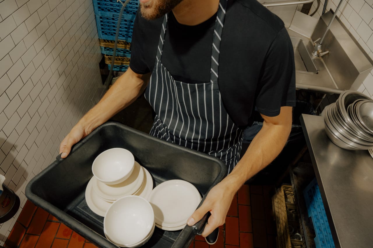 What Is a Busser? Responsibilities, Wages, + Career Growth
