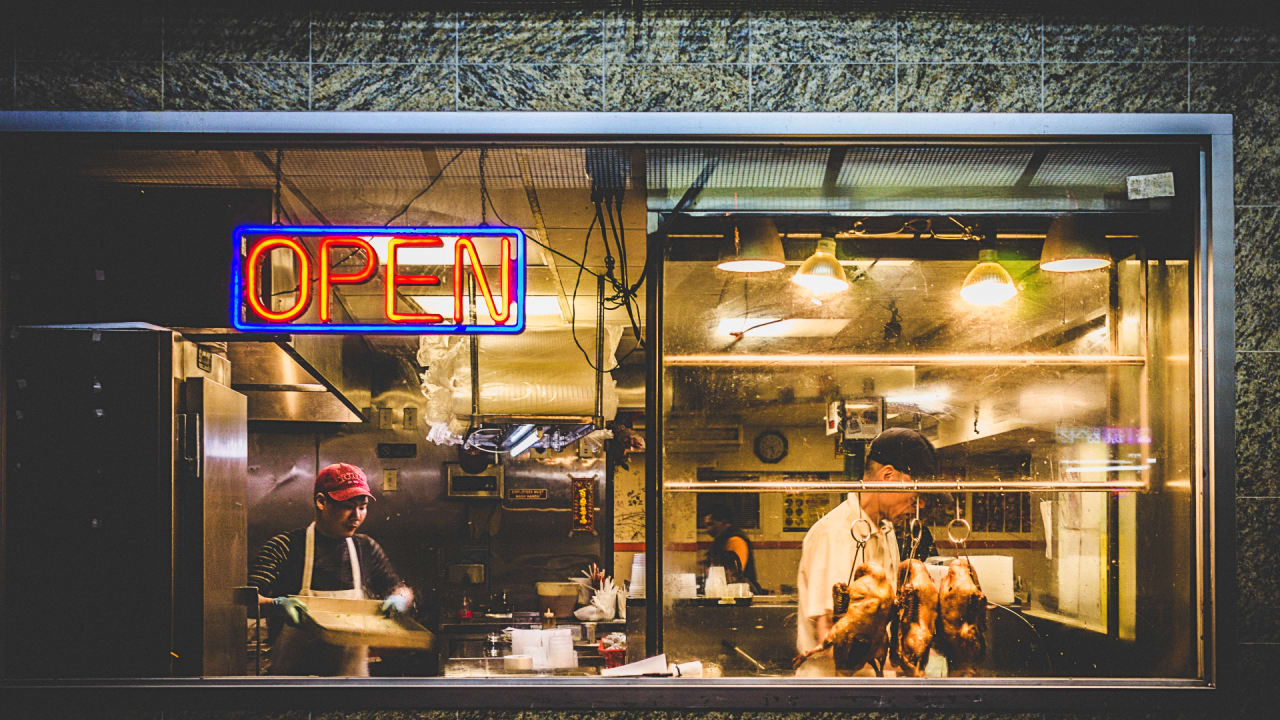 workers prepared for end of business day in restaurant.