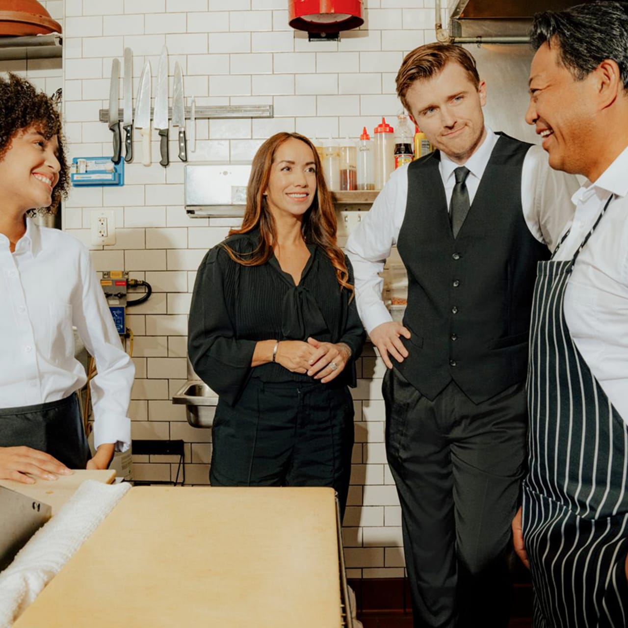 A manager training hospitality staff