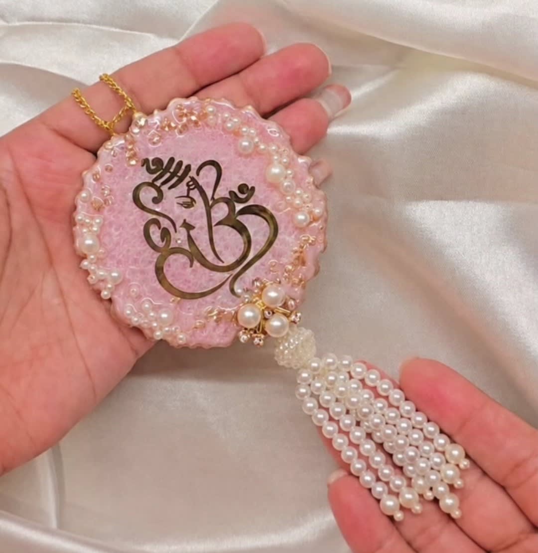 Handmade Pink Resin Ganesha Hanging with Pearl Detailing