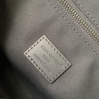 Christopher Embossed Monogram Coated Messenger Bag 9