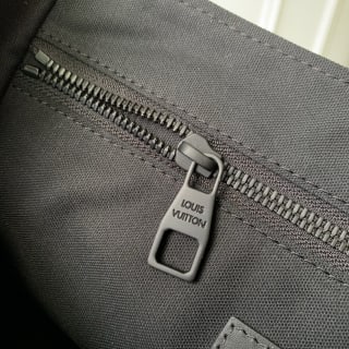 Christopher Embossed Monogram Coated Messenger Bag 8