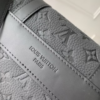 Christopher Embossed Monogram Coated Messenger Bag 7