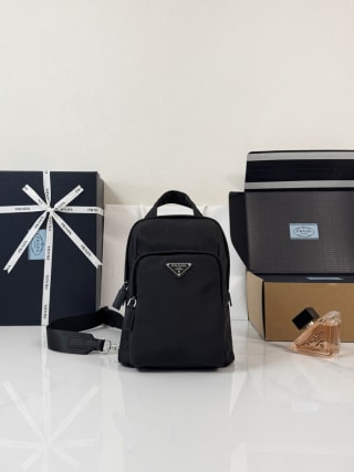 Re-Nylon and Saffiano Leather Sling Backpack 1