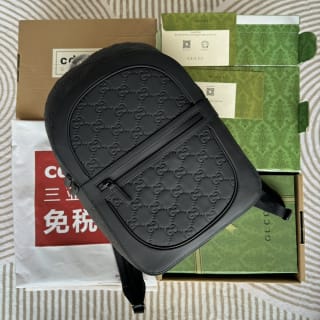 GG Embossed Leather Backpack 1