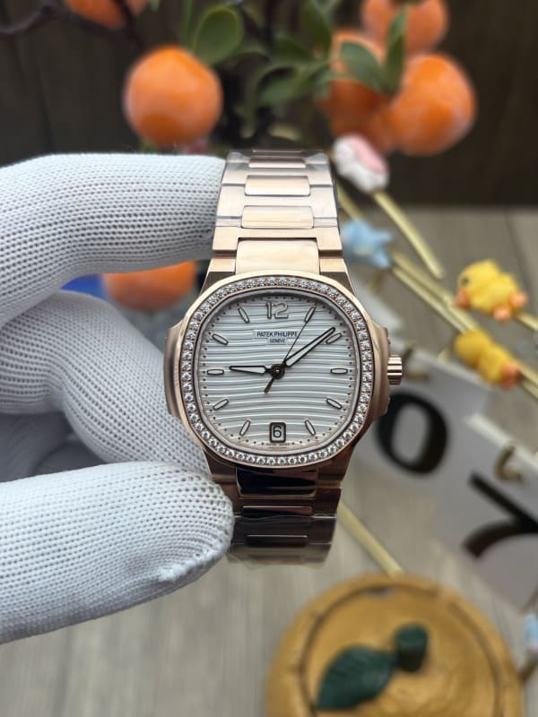 Patek Philippe Nautilus Ladies' Self-Winding Rose Gold Diamond White Dial