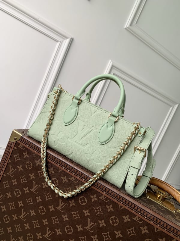 Louis Vuitton Onthego East-West Embossed Monogram Coated Top Handle Bag