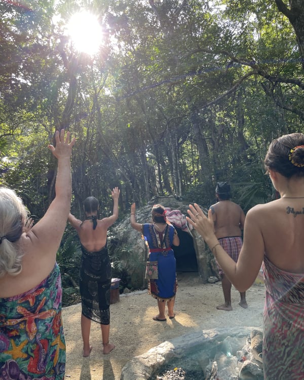 Women gathered at the temazcal dome before entering the sweat lodge