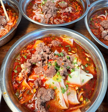 Freshly served bowls of Hunan rice noodles