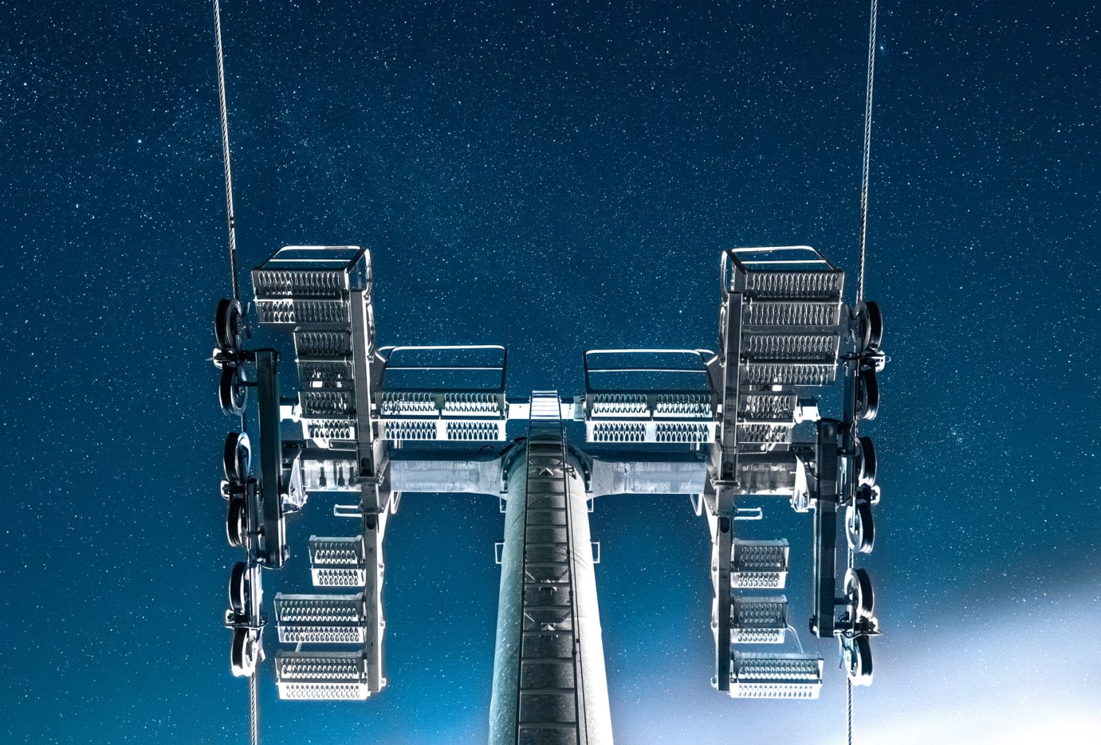 A stunning view of a ski lift at night, set against a starry sky in Borovets, Sofia Province, Bulgaria.