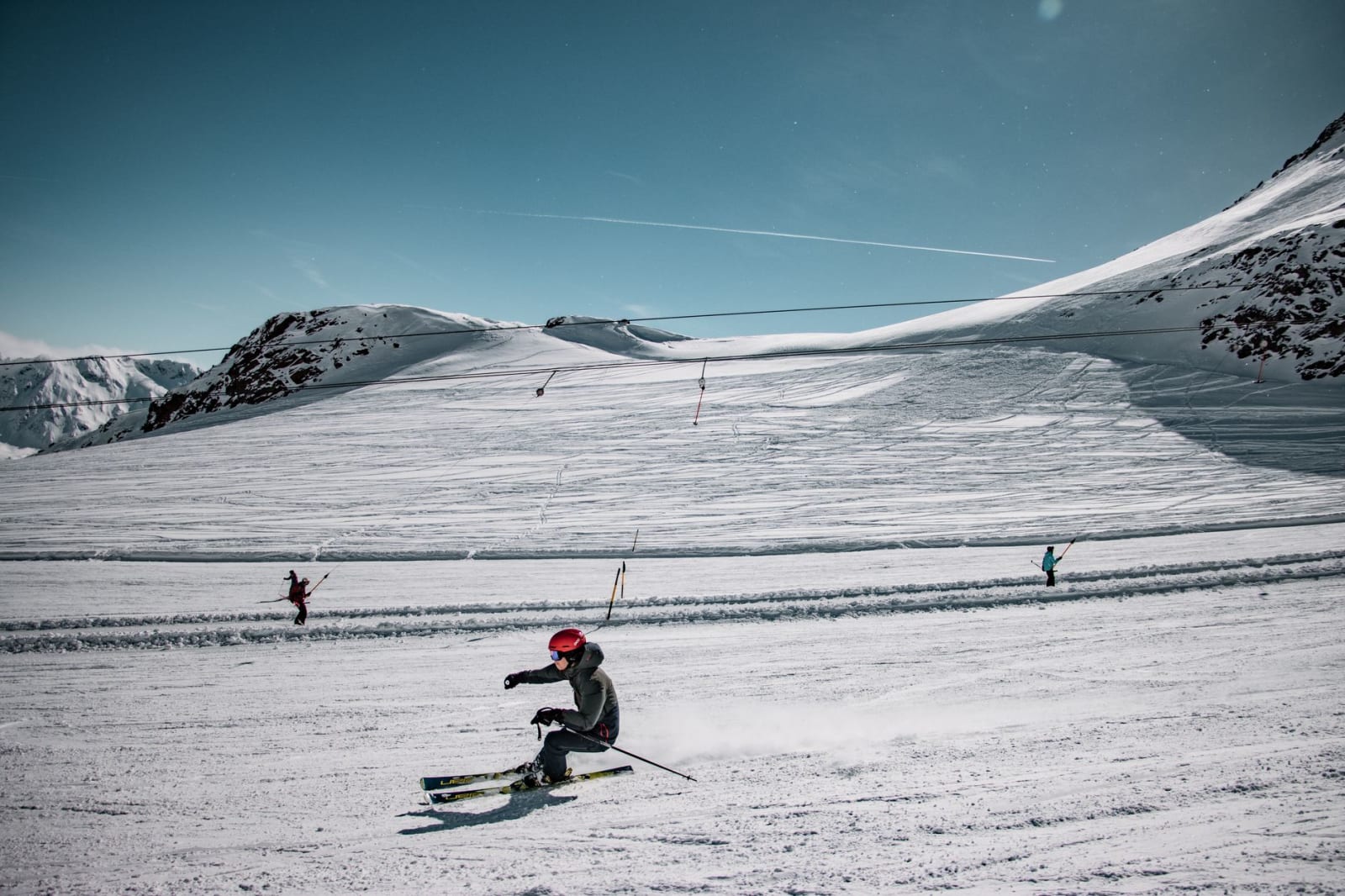 Skiers enjoying a thrilling day on Sölden's snowy slopes in winter.