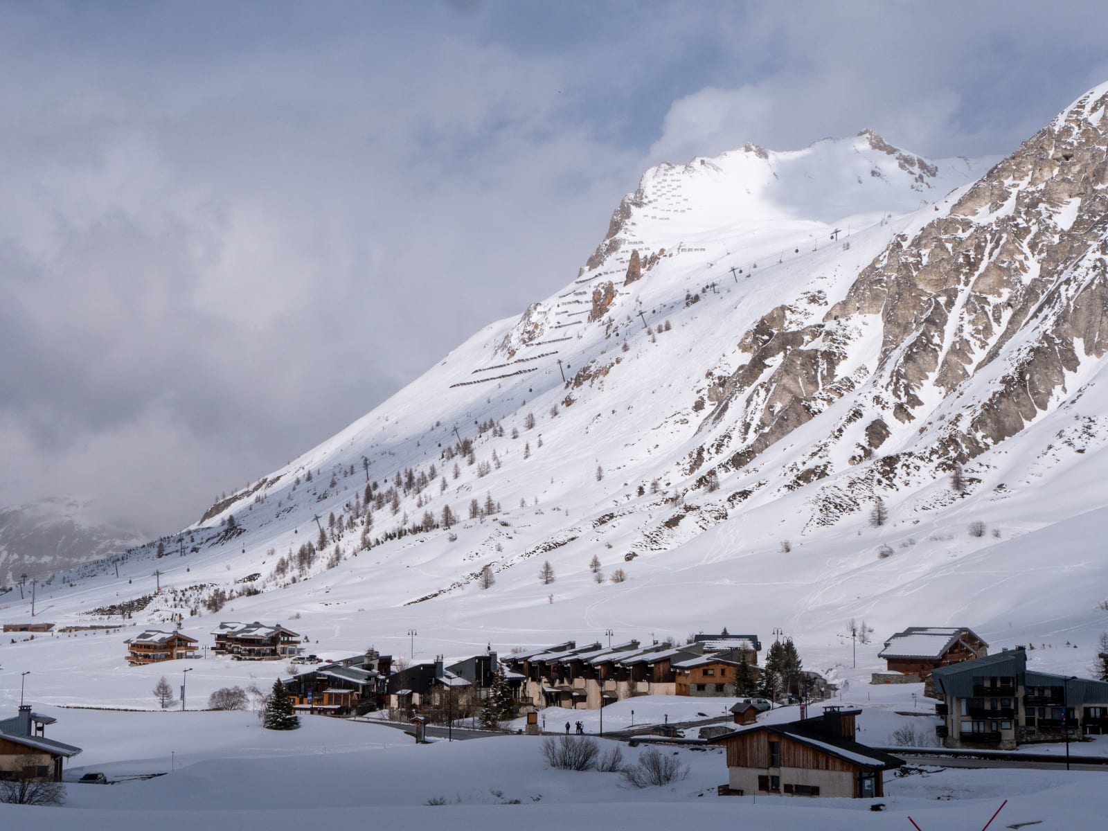 Tignes village below snowy peaks in the French Alps