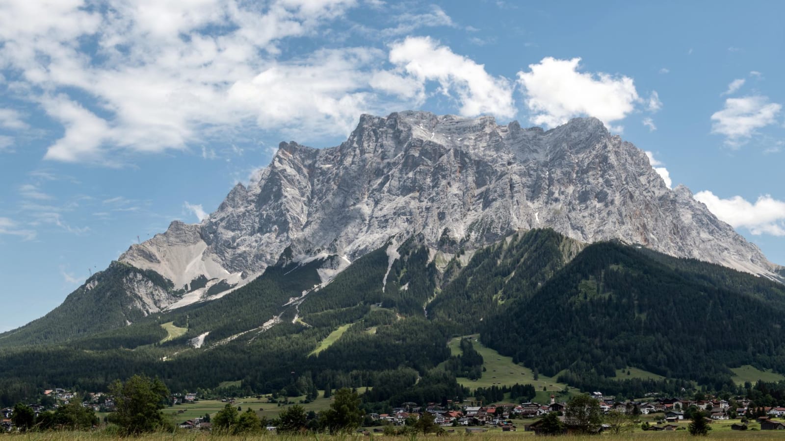 Scenic view of the Zugspitze mountain with Lermoos village in Tirol, Austria.