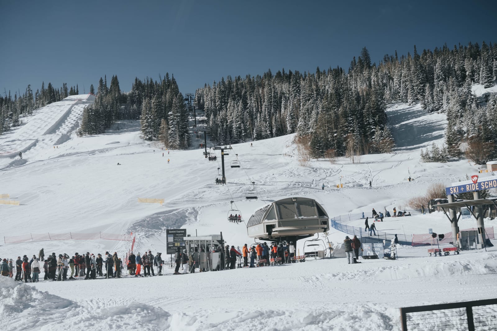 Skiers, chairlifts and slopes at a Colorado ski resort
