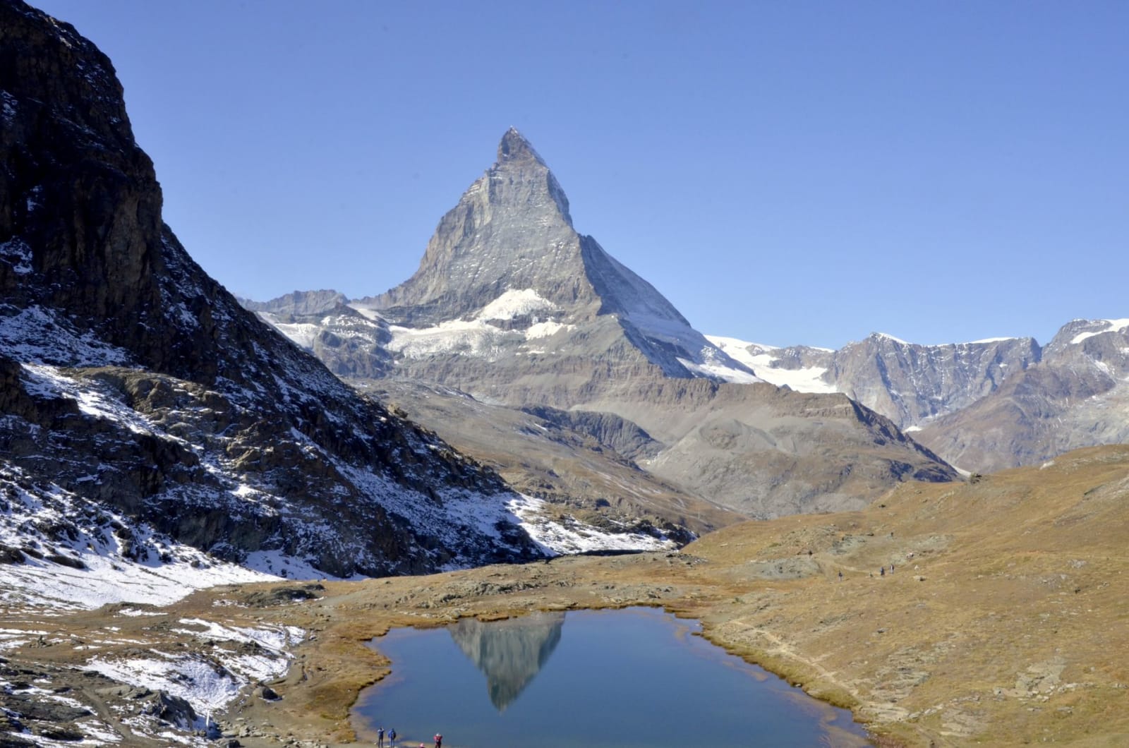 Breathtaking landscape of the Matterhorn with clear lake reflection in Valtournenche, Italy.