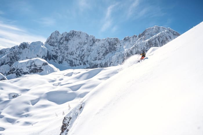Skier enjoying the pristine snow in the Italian Alps at Colere, Lombardia.