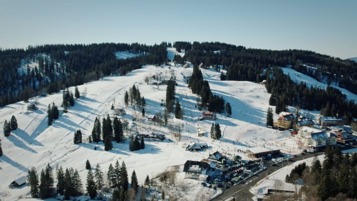 Aerial view of snowy forest and hills at Feldberg, Germany