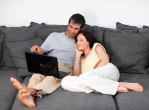 couple talking on laptop