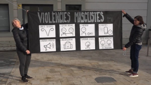DonArt penja una pancarta contra les violències masclistes