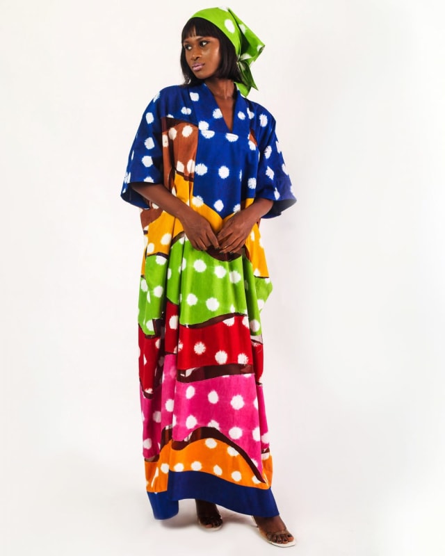 Loungewear in Africa - Ituen Basi - a multicolored polka dot long free gown