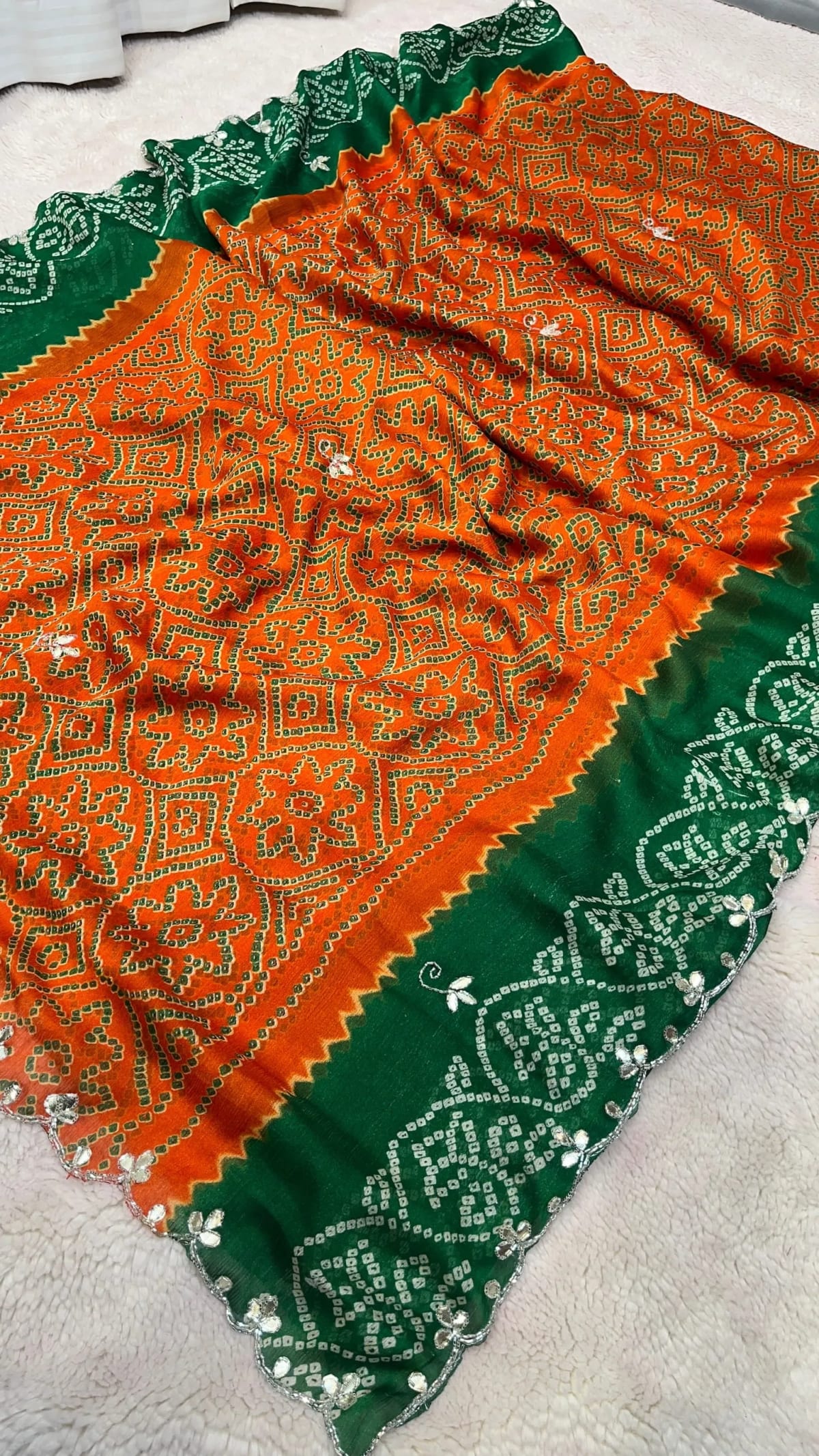 Elegant Georgette Fabric Bandhej Saree Adorned with Luxurious Kundan Patti Work