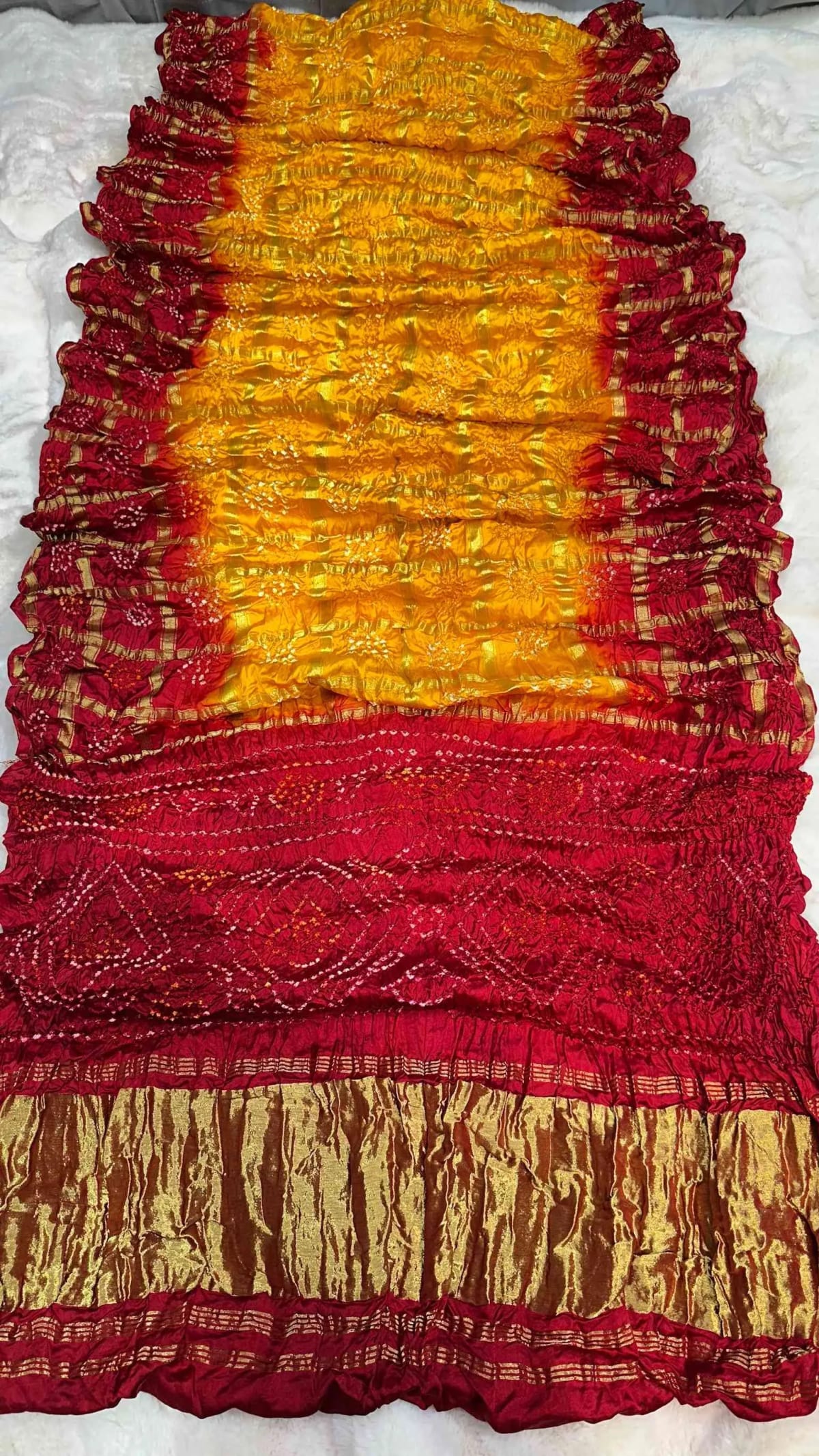 Modal Silk Fabric Saree with Lakdi Patta Zari Work & All Over Hand Bandhej Design