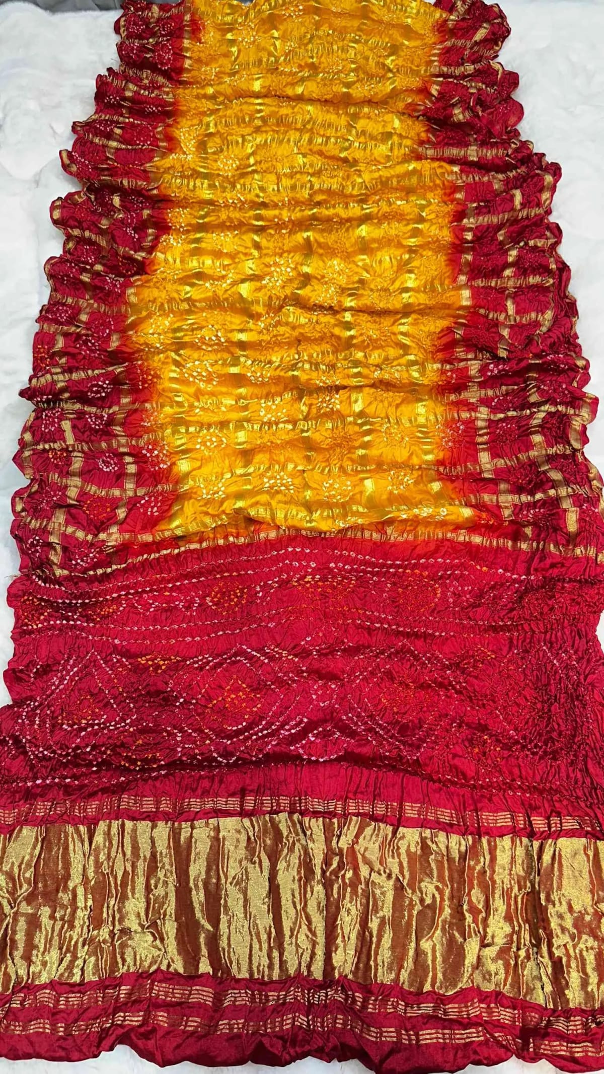 Modal Silk Fabric Saree with Lakdi Patta Zari Work & All Over Hand Bandhej Design