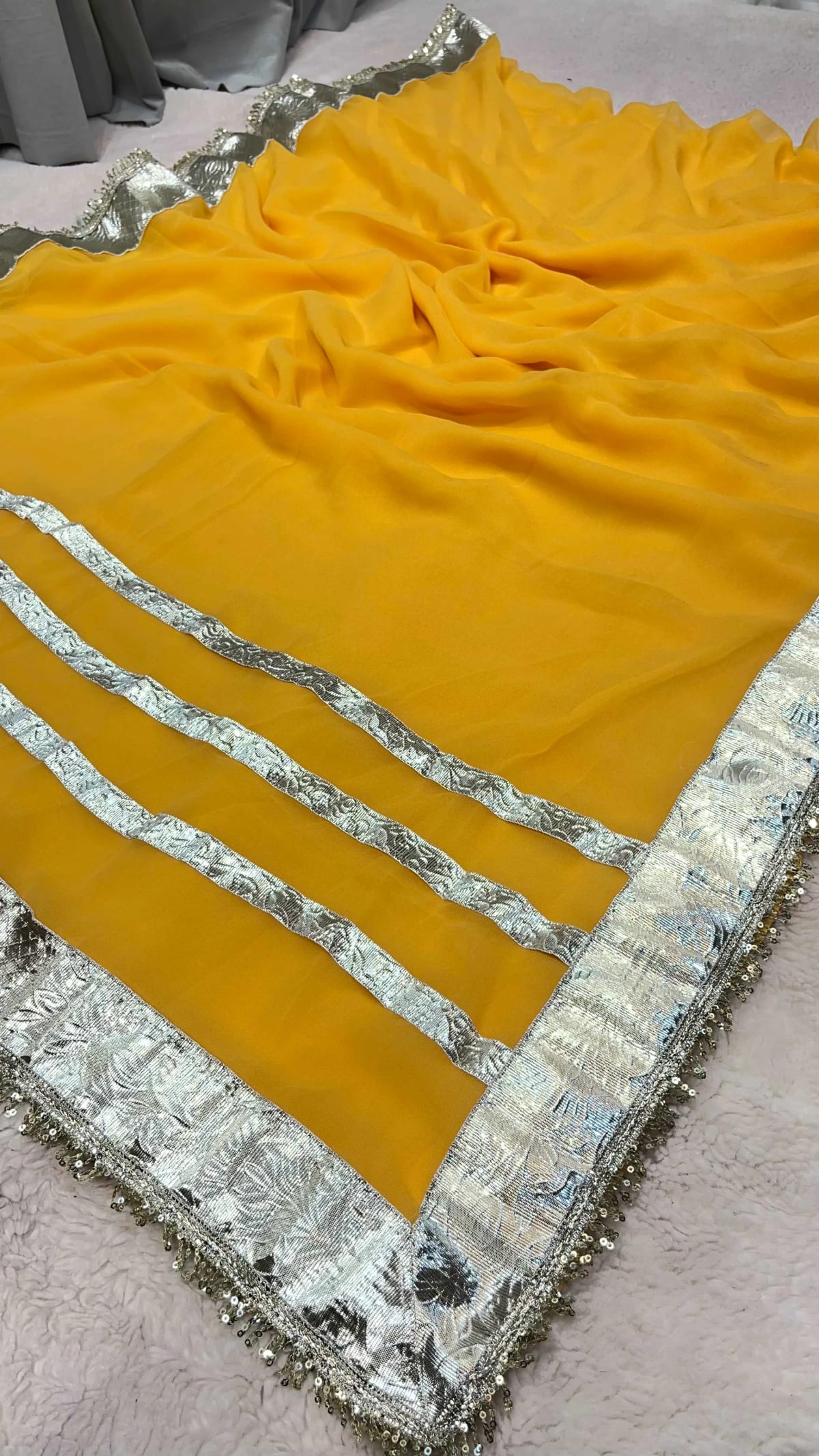 Flowy Georgette Fabric Saree Accented with Traditional Gota Patta Handwork