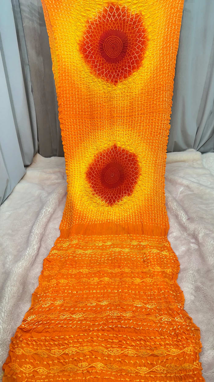 Pure Ojariya Crepe Saree with Febiyana Hand Bandhej & Double Shade Hand Tie-Dye