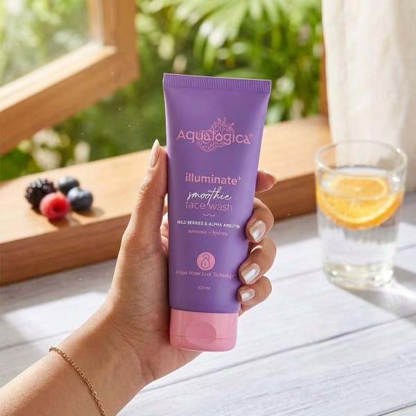 Aqualogica FREEBIE Illuminate+ Smoothie Face Wash - 100ml held in hand, candid photo