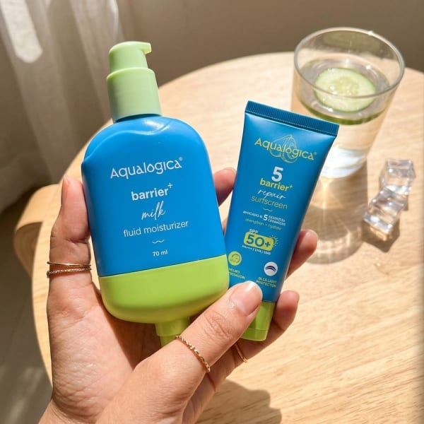 Aqualogica Barrier Boosting Pair held in hand, candid photo