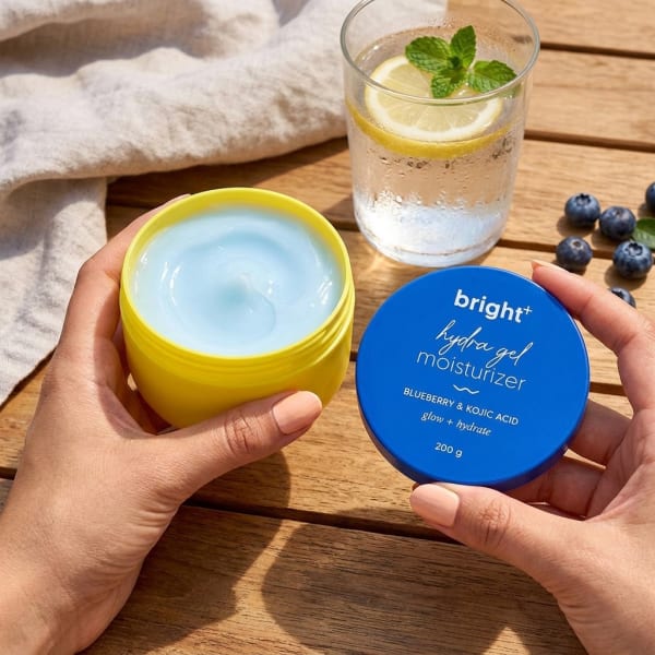 Aqualogica Bright+ Hydra Gel Moisturizer with Blueberry & Kojic Acid - 200 g held in hand, candid photo