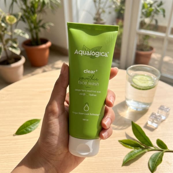 Aqualogica FREEBIE - Clear+ Smoothie Face Wash 100 ml held in hand, candid photo